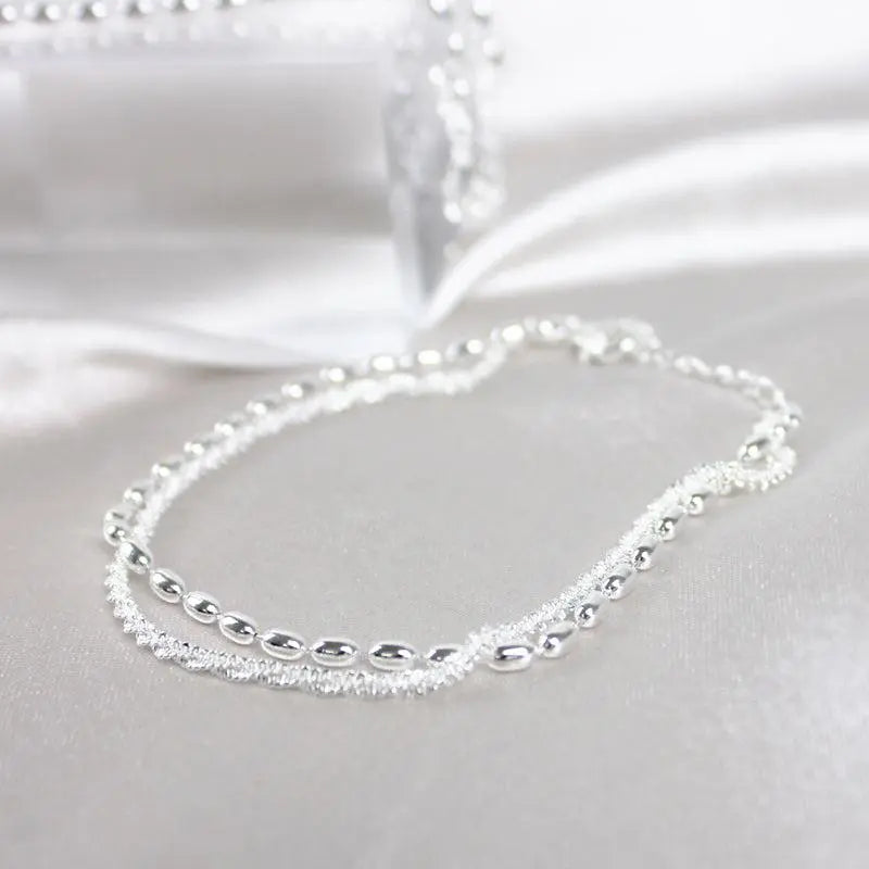 Elegancki zestaw bransoletek srebrnych z kamieniami z cyrkonu