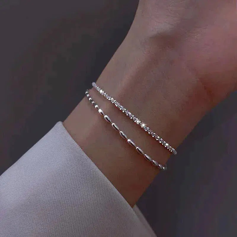 Elegancki zestaw bransoletek srebrnych z kamieniami z cyrkonu